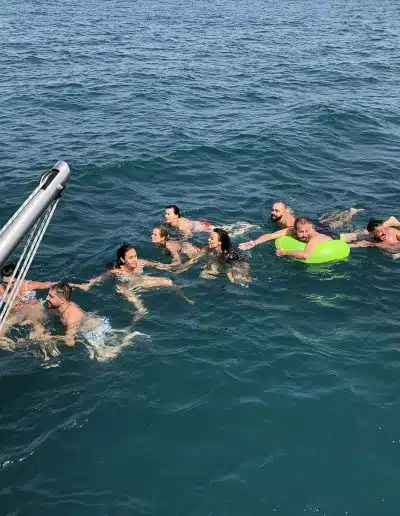 Bathing in the open sea from the boat